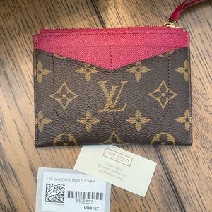 Louis Vuitton monogrammed petite card holder with zipper